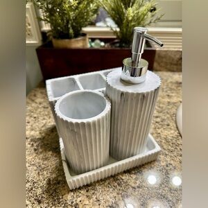 WHITE FLUTED FAUX, MARBLE BATH ACCESSORIES. CLEAN LINES & TIMELESS LUXURY.